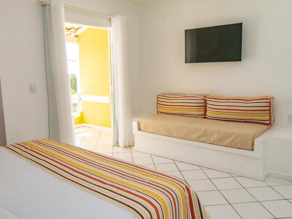 Pousada dos Reis : photo 5 de la chambre suite lit king-size avec baignoire spa