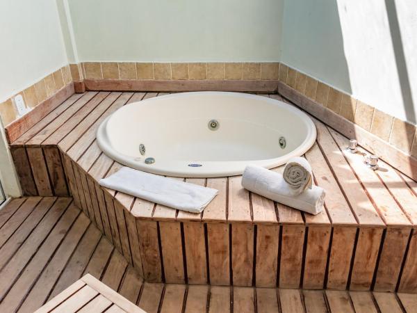 Pousada dos Reis : photo 6 de la chambre suite avec baignoire spa