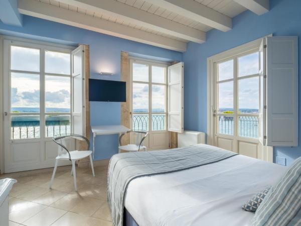 Palazzo Alfeo Aparthotel : photo 4 de la chambre appartement avec terrasse