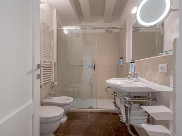 Palazzo Alfeo Aparthotel : photo 3 de la chambre appartement - rez-de-chaussée