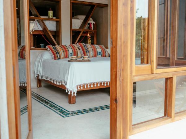 Hotel Poc Na Tulum : photo 9 de la chambre suite casa pocna avec climatisation - vue sur jungle