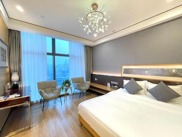 重庆熙岸江景酒店 Chongqing Serenity Riverside Hotel : photo 7 de la chambre river view king room 
