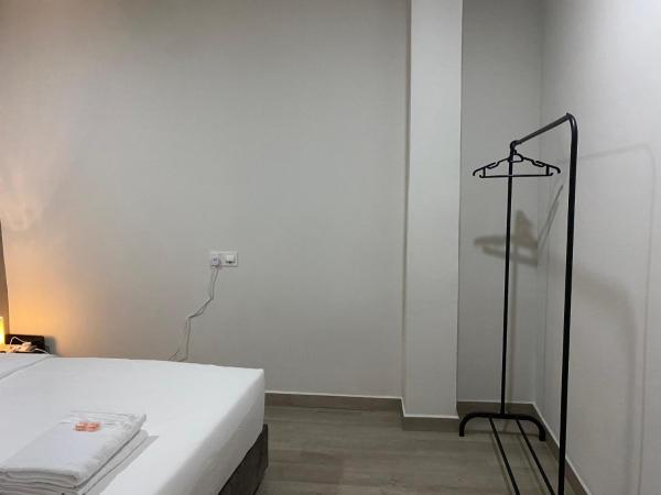 Aayu Muntri : photo 5 de la chambre chambre lit queen-size avec salle de bains commune