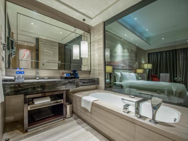 Wanda Realm Wuhan : photo 2 de la chambre chambre lit king-size deluxe