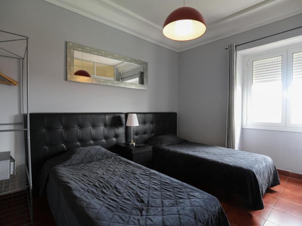 V Dinastia : photo 2 de la chambre chambre lits jumeaux verte - sans ménage