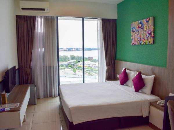 D'Wharf Hotel & Serviced Residence : photo 2 de la chambre chambre lit king-size supérieure