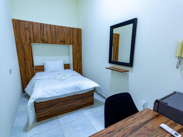 Comfortable Private Rooms in Compound Housing : photo 4 de la chambre chambre simple standard avec salle de bains commune