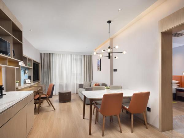 Home2 Suite by Hilton Chongqing Jiangbei : photo 2 de la chambre suite deluxe