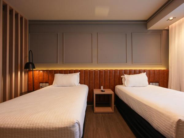 Grand Mercure Curitiba Rayon : photo 8 de la chambre chambre lits jumeaux de luxe premium