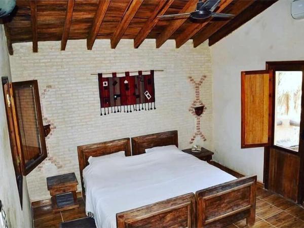 Dar Horchani Tozeur : photo 3 de la chambre chambre quadruple - vue sur jardin