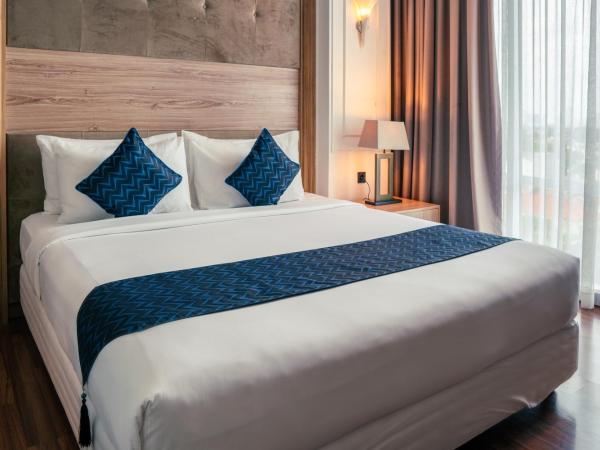 Azana Suites Hotel Antasari : photo 1 de la chambre chambre lit king-size deluxe