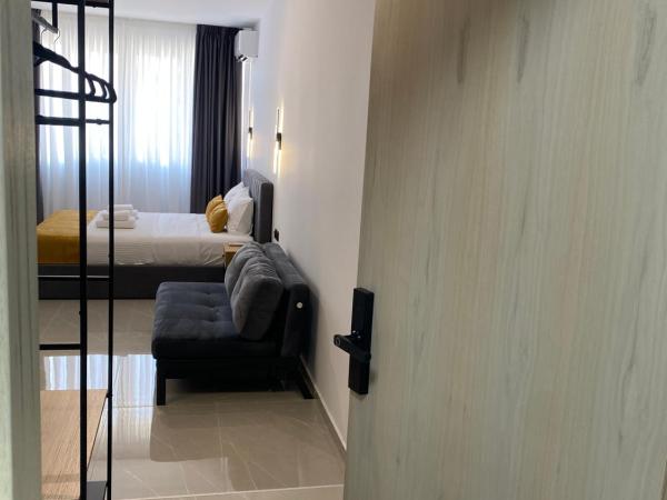 Thess Living Suites : photo 3 de la chambre suite familiale