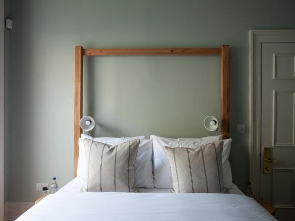 Lido Townhouse : photo 3 de la chambre chambre lit king-size