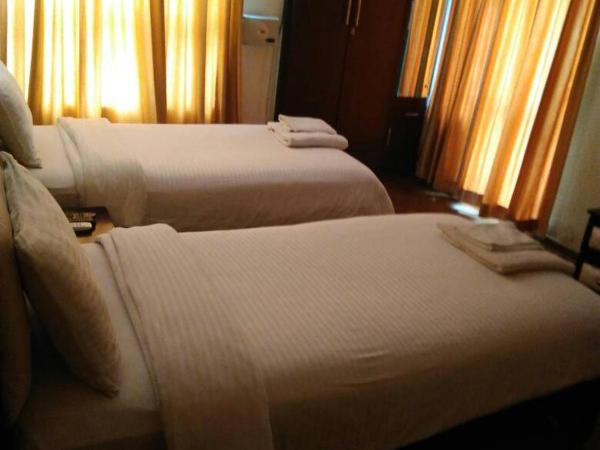 Royal Service Apatment : photo 1 de la chambre chambre double ou lits jumeaux