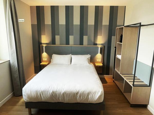 Kyriad Limoges - Ester : photo 10 de la chambre chambre standard lit queen-size