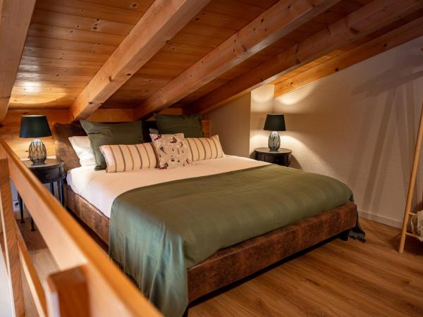 The Glen - GRINDELHOMES : photo 2 de la chambre the gemschi apartment