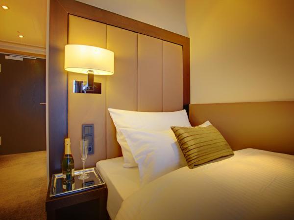 Hotel Favor : photo 1 de la chambre chambre simple ambiente