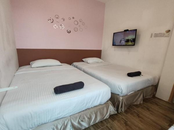 Maleeq Hotel @ Meru Ipoh : photo 2 de la chambre chambre deluxe double ou lits jumeaux