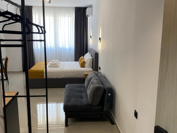 Thess Living Suites : photo 4 de la chambre chambre quadruple supérieure 