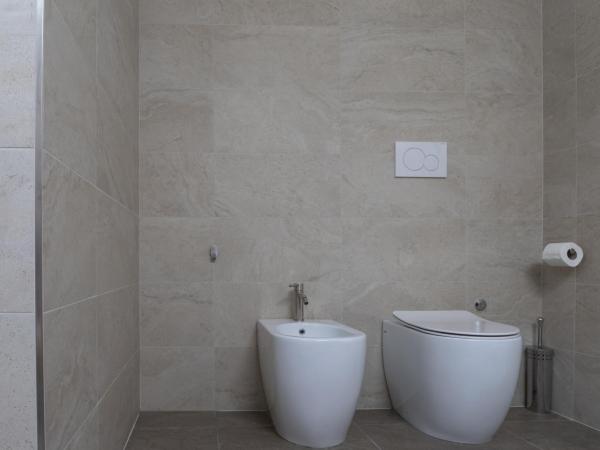 Santo Stefano Loft : photo 3 de la chambre appartement loft 1 chambre avec balcon