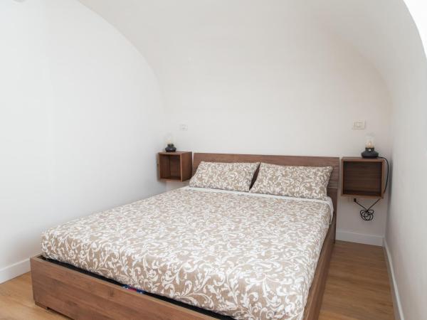 Santo Stefano Loft : photo 5 de la chambre appartement loft 1 chambre avec balcon