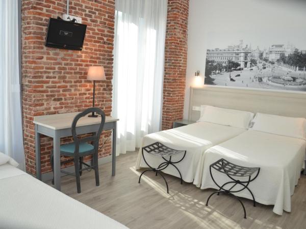 Hostal San Lorenzo : photo 3 de la chambre chambre triple