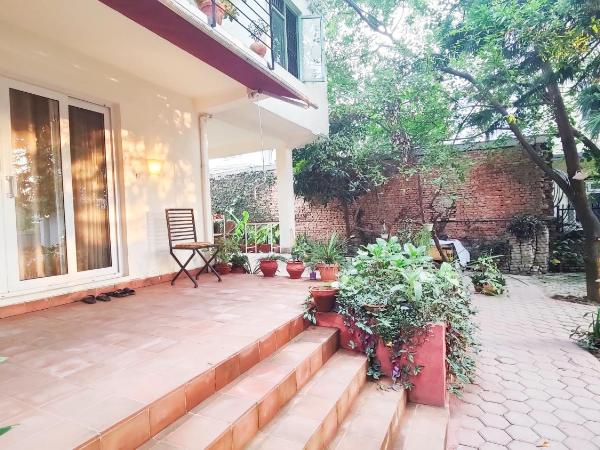 Nextdoor Kathmandu : photo 2 de la chambre chambre double - vue sur jardin