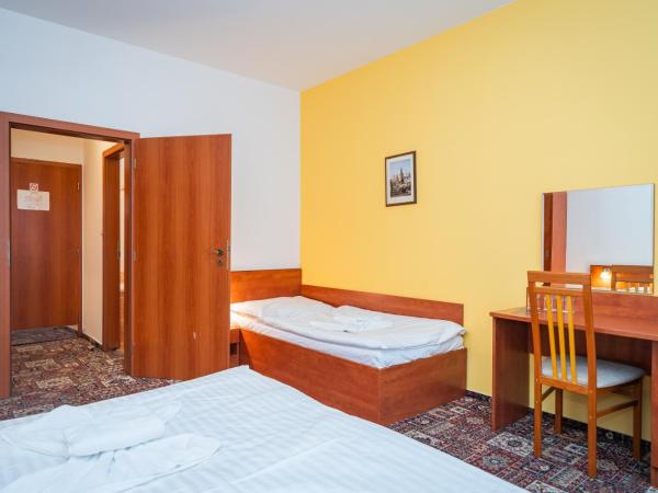 City Central De Luxe : photo 4 de la chambre chambre triple