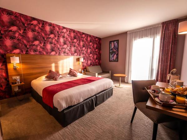 Brit Hotel Eden SPA Honfleur : photo 1 de la chambre chambre triple