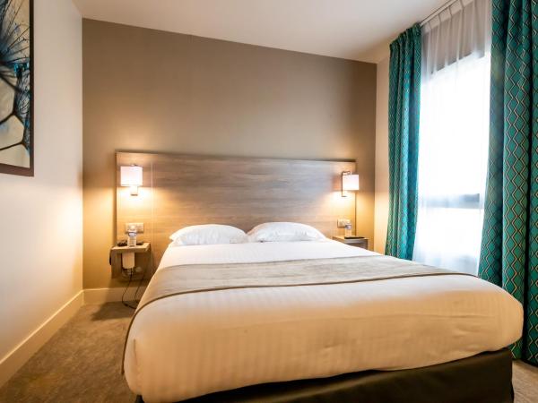 Brit Hotel Eden SPA Honfleur : photo 9 de la chambre chambre familiale