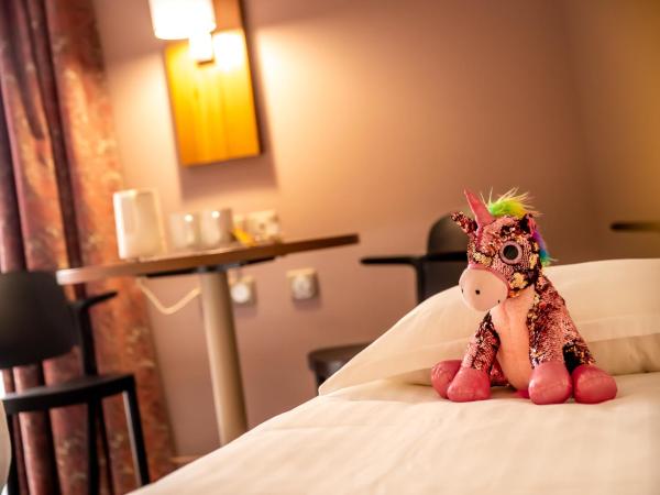 Brit Hotel Eden SPA Honfleur : photo 7 de la chambre studio triple supérieure