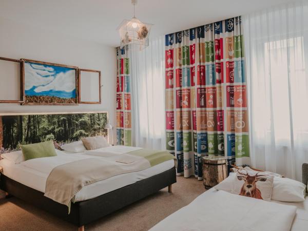 Boutiquehotel Stadthalle : photo 1 de la chambre chambre triple standard