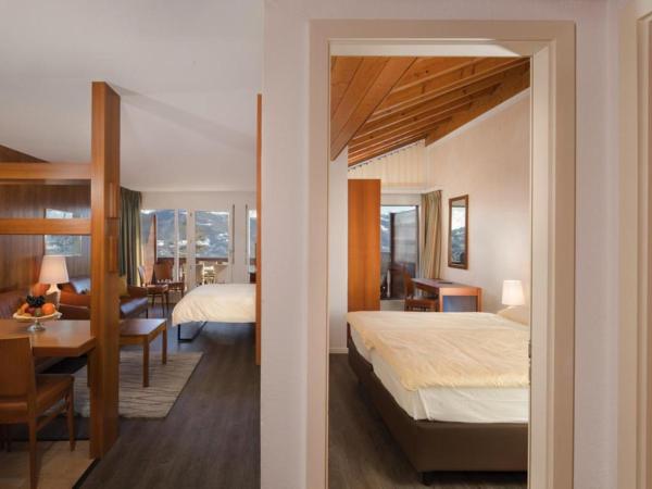 Hotel Helvetia Intergolf : photo 1 de la chambre chambre quadruple exécutive avec balcon - vue sur montagnes