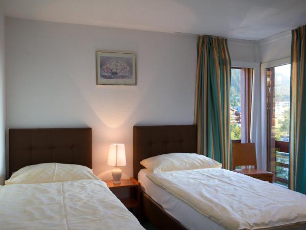 Hotel Helvetia Intergolf : photo 7 de la chambre suite 2 chambres avec balcon - vue sur montagne