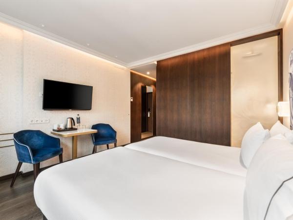 Eurostars Universal Lisboa : photo 3 de la chambre chambre deluxe double ou lits jumeaux