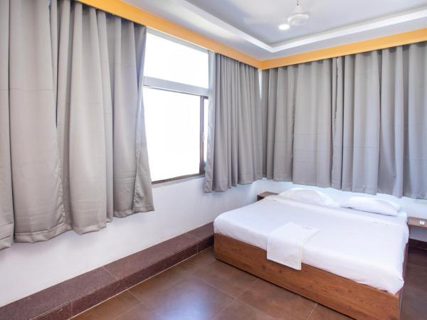 Stayz Inn Mylapore near light house : photo 6 de la chambre chambre double deluxe - vue latérale sur mer