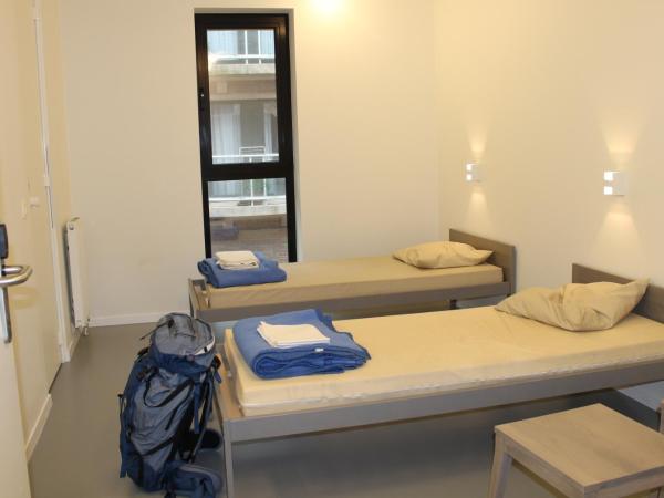 De Ploate Hostel : photo 1 de la chambre chambre lits jumeaux avec salle de bains privative