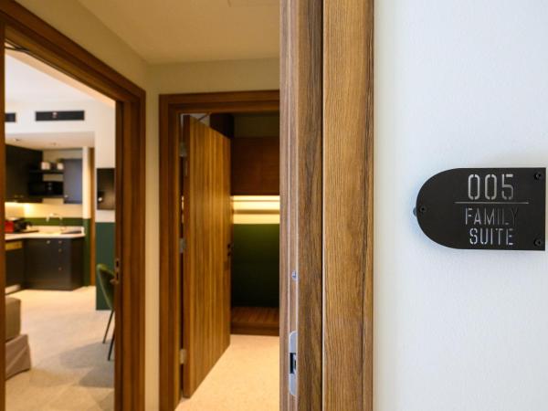 Evripidou 7 - Kalamata Mediterranean Suites : photo 1 de la chambre suite familiale