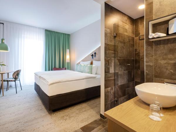 ARCOTEL HafenCity Dresden : photo 2 de la chambre chambre double ou lits jumeaux