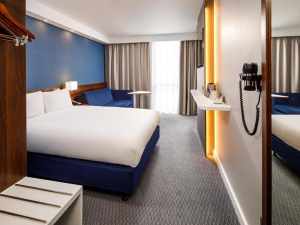 Holiday Inn Express London - ExCel, an IHG Hotel : photo 1 de la chambre chambre double standard avec canapé-lit