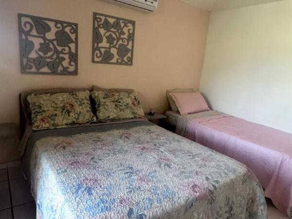 Pousada Do Maraja : photo 2 de la chambre chambre triple avec salle de bains privative