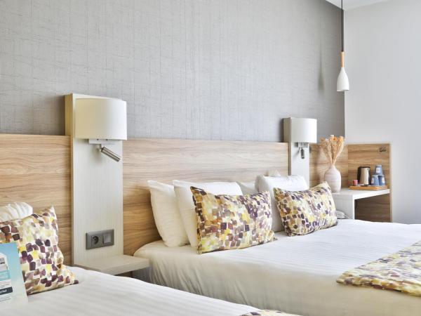 Kyriad Pontarlier : photo 3 de la chambre chambre triple (1 lit double et 1 lit simple)