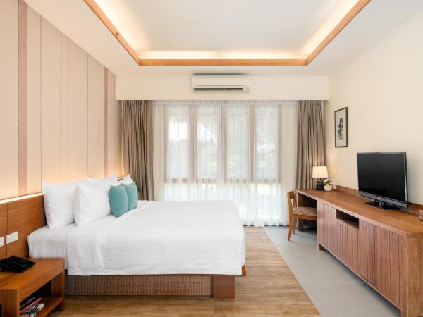 SAii Phi Phi Island Village : photo 1 de la chambre bungalow 1 lit king-size deluxe - côté jardin