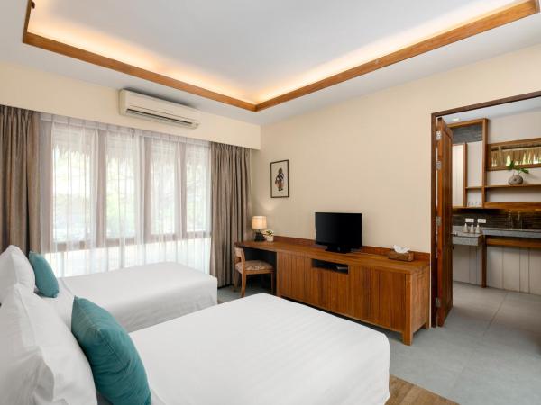 SAii Phi Phi Island Village : photo 3 de la chambre bungalow 2 lits jumeaux deluxe - côté jardin