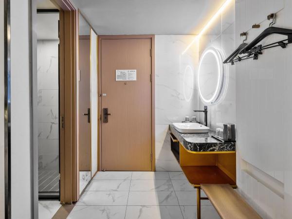 上海徐汇区肇嘉浜路万信至格酒店 : photo 2 de la chambre chambre simple