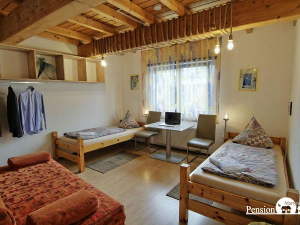 Pension Martyniak : photo 2 de la chambre chambre triple avec toilettes communes