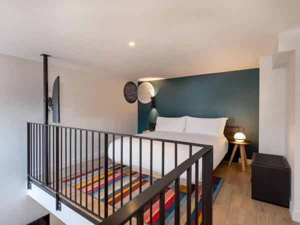 Aloft Hotel, By Marriott : photo 7 de la chambre chambre aloft en duplex avec lit king-size, canapé-lit et vue sur ville - accès au spa inclus