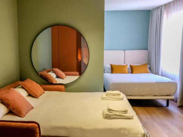 Tribu Malasaña : photo 2 de la chambre chambre familiale deluxe