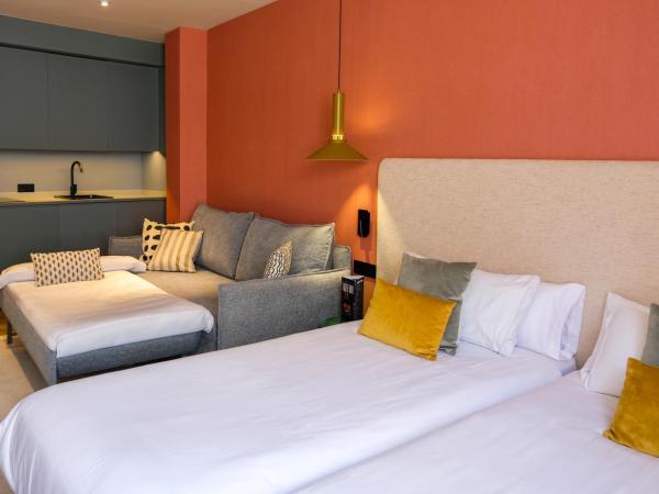 Tribu Malasaña : photo 3 de la chambre chambre familiale deluxe