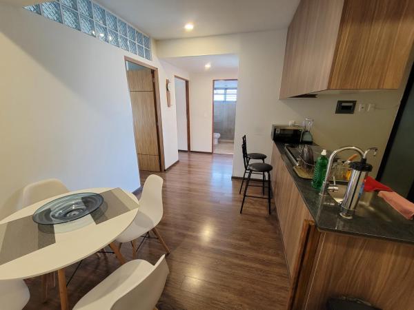 WTC Suites : photo 8 de la chambre chambre lit queen-size avec balcon